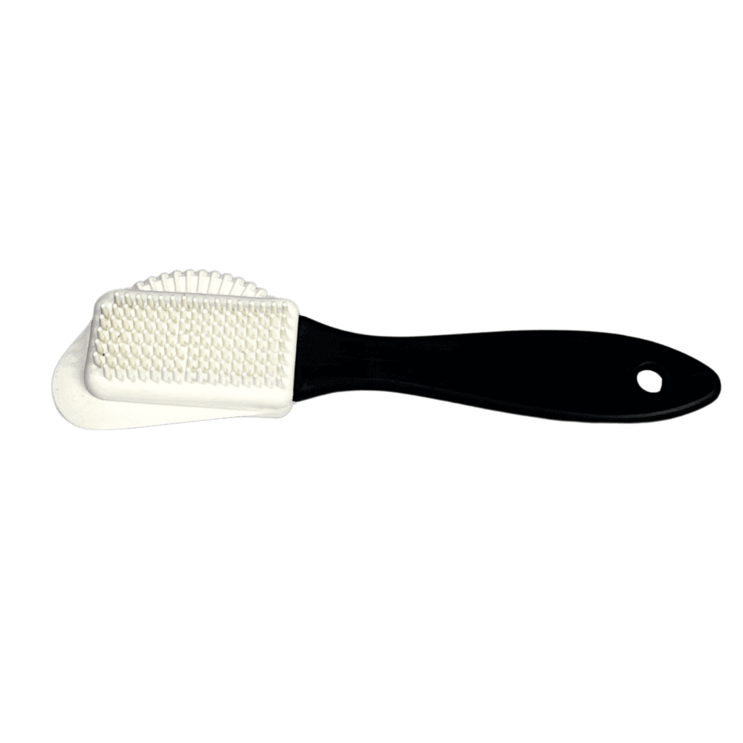 URAD Deluxe Nubuck and Suede Brush in action, demonstrating how it effectively cleans and revives delicate nubuck and suede materials on shoes.