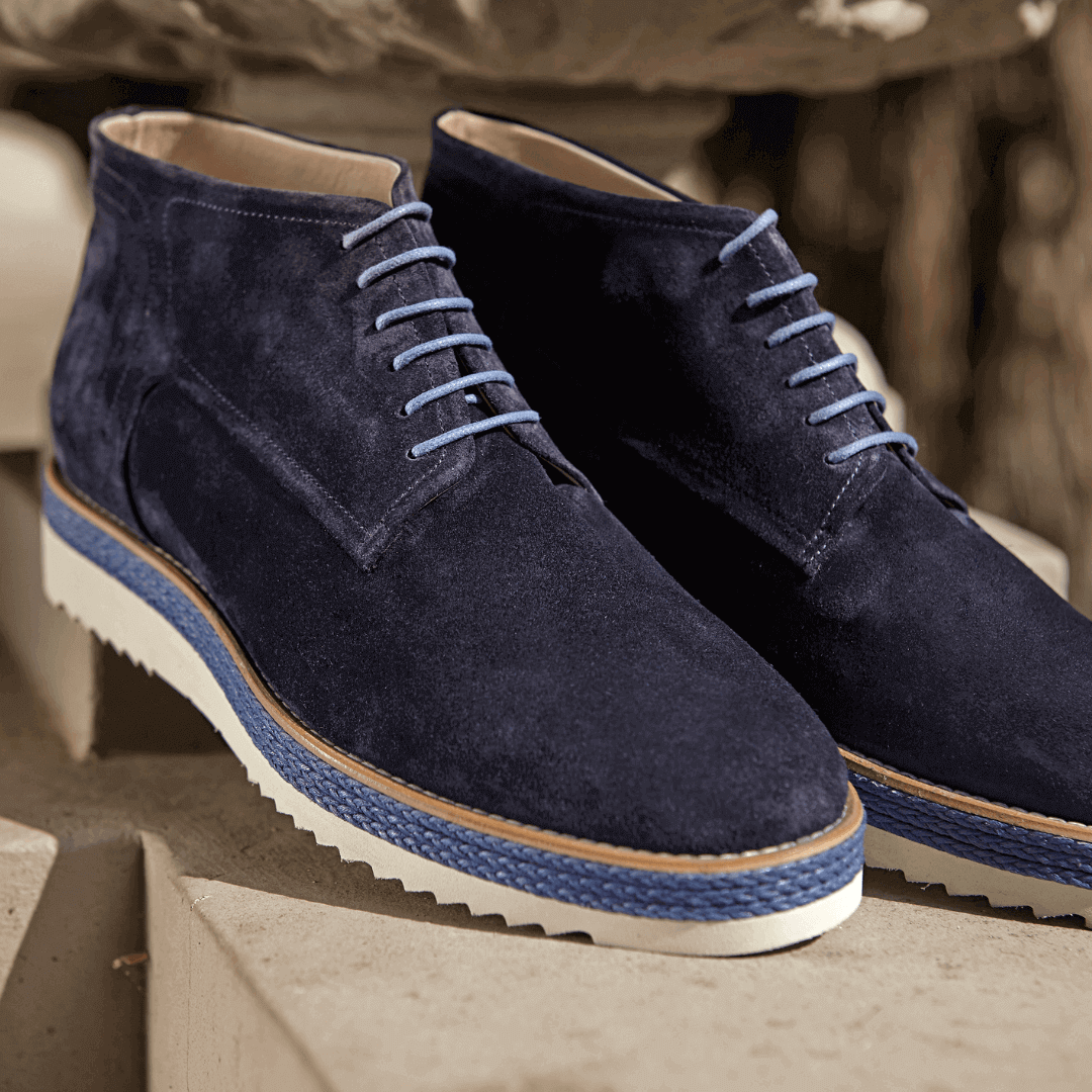 Black suede dress shoes, suede heeled boots, or just a lovely pair of purple suede boots. Keep them clean by brushing them regularly.