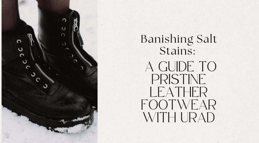 Close-up of leather boots in snow illustrating how to clean salt stains off leather shoes.